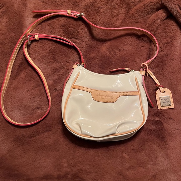 Dooney & Bourke cream patent leather purse with tan and red details. - Picture 2 of 7